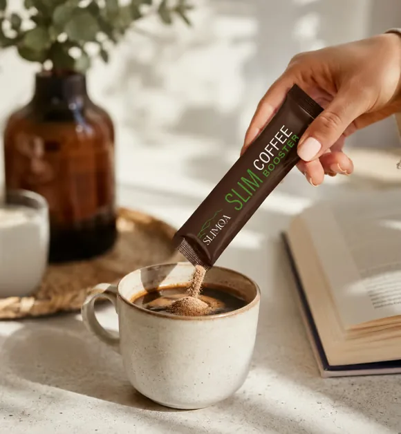 SlimQA Coffee Booster sachet being added to coffee
